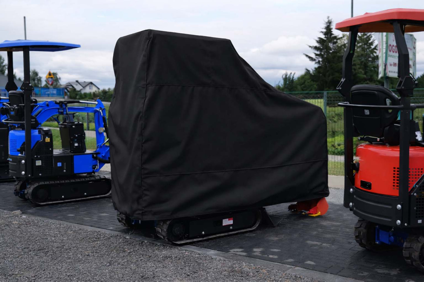 Maßgefertigte Bagger Abdeckung auf der Baustelle
